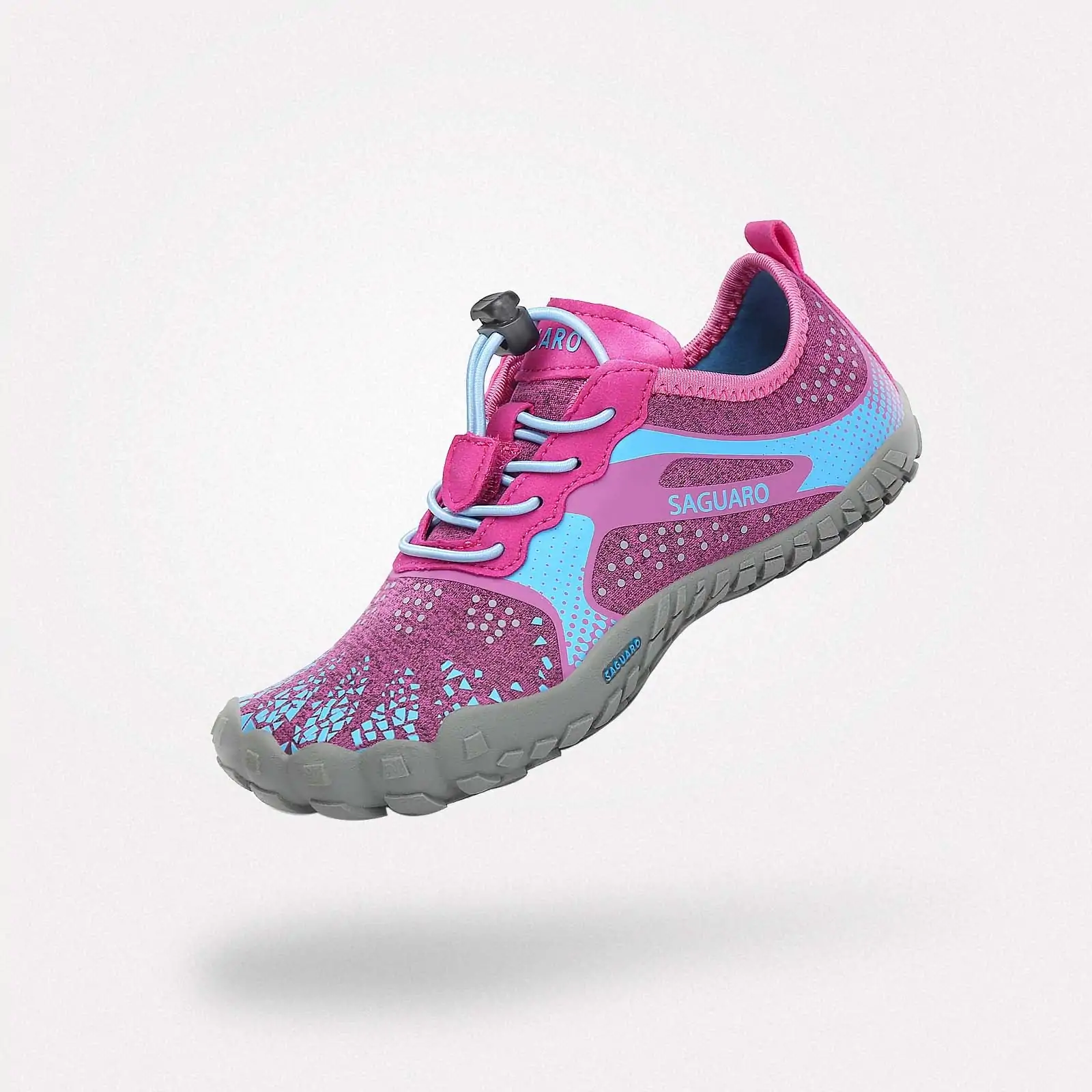 Deportiva Saguaro rosa con detalles en azul, zapatilla barefoot para niños, suela flexible y diseño ergonómico para máxima comodidad.