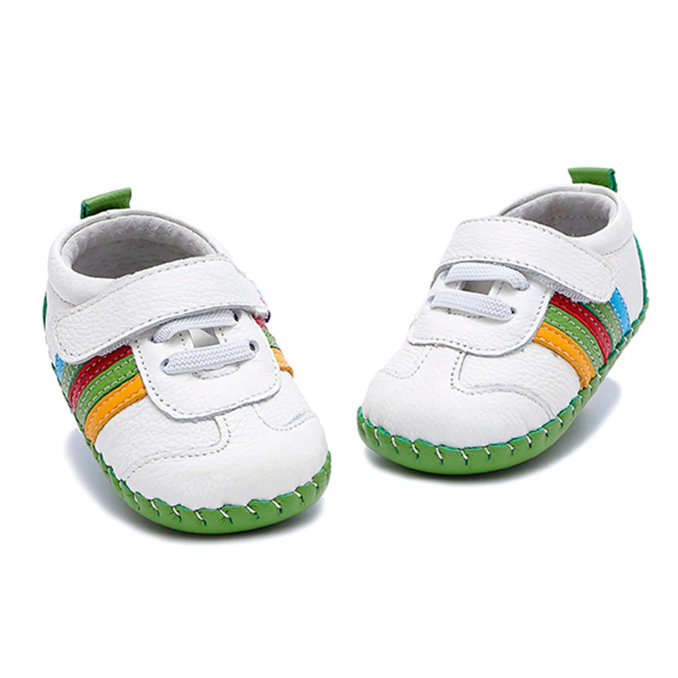 Zapatillas deportivas niño Freycoo en piel blanca con detalles multicolor y suela verde