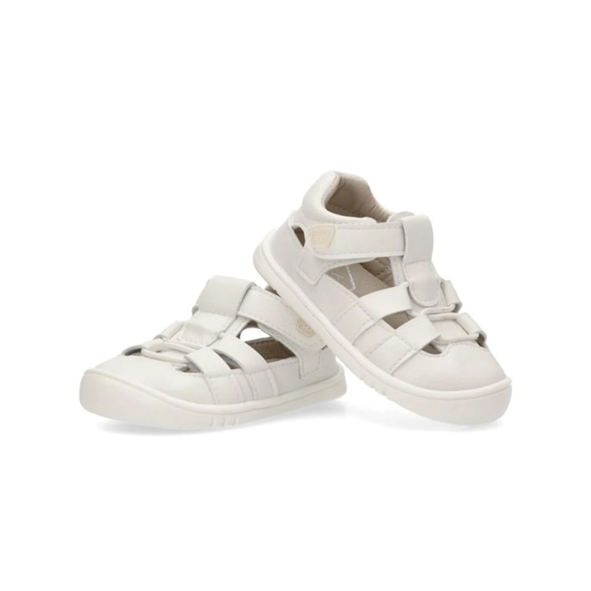 Vista superior de la sandalia barefoot Piruflex PF274 en color blanco, con tiras ajustables y diseño anatómico que respeta la forma natural del pie infantil.